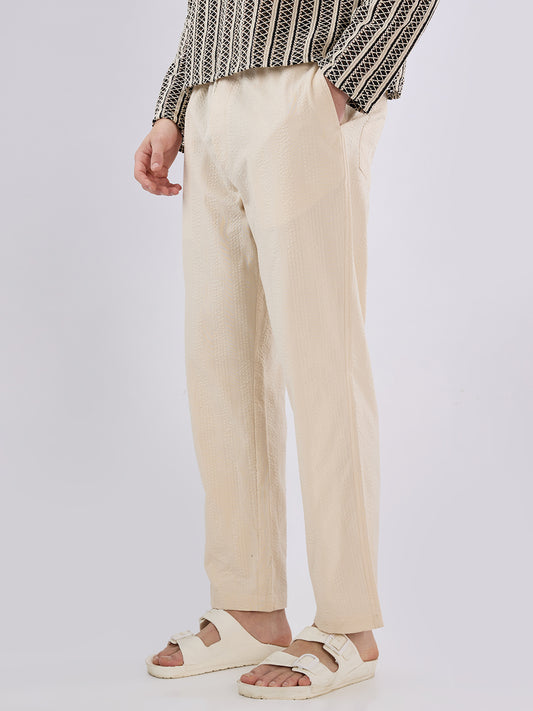Bisque Beige Seersucker Striped Tapered Trousers